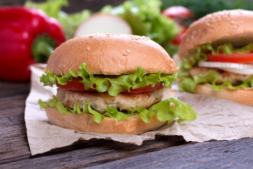 Delicious homemade hamburger on wood