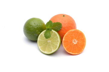 Limes and tangerines on white background