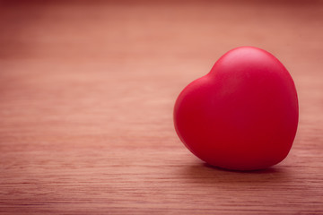 Fototapeta premium Heart of love in Valentine's day on wooden.