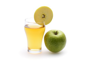 Apple juice in glass on white background