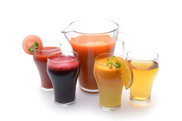 Fresh fruit and vegetable juices on white background
