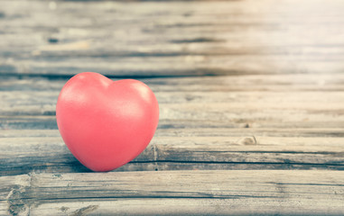 Fototapeta premium Heart of love in Valentine's day on wooden.