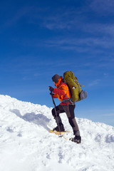 Winter hiking in snowshoes.