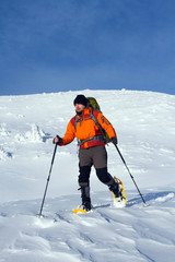 Winter hiking in snowshoes.