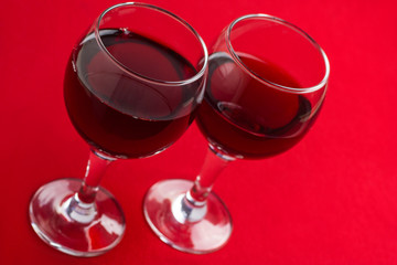 Two glasses with red wine.
