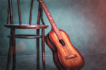 Vintage Guitar on grungy background