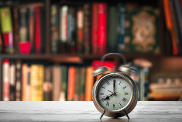 Alarm Clock on the bookshelf