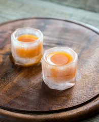 Two cocktails in ice glasses