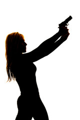 silhouette of a woman pointing a gun to the side close