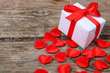 Holidays gift and red hearts