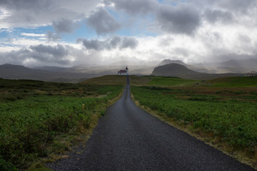 Icelandic church set in dramatic landscape