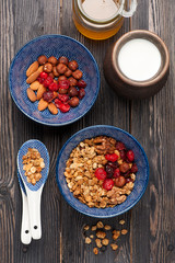 Muesli granola with honey, nuts and dried fruits. Top view.