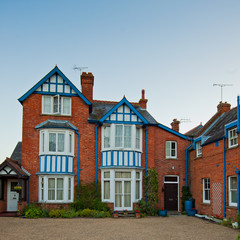 Fototapeta na wymiar Front Door of a Beautiful Red Brick House