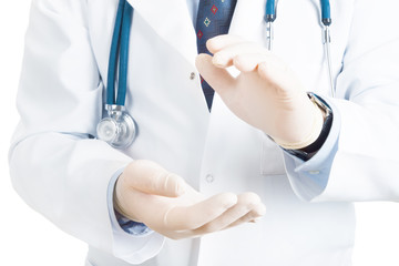 close up of male doctor holding something in his hand