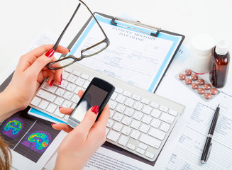 Doctor, nurse taking a phone and calling to patient