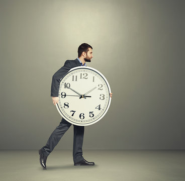 Man With Clock Going Forward