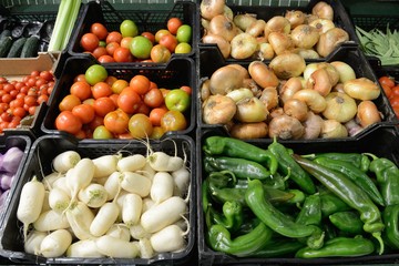 trays of fruit and vegetables in the store