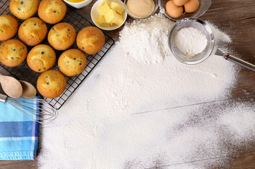 Baking cake muffin cup white flour background with ingredients photo