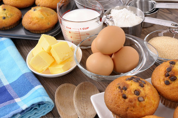 Baking cake ingredients with fresh muffins photo