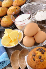Baking cake ingredients with fresh muffins photo