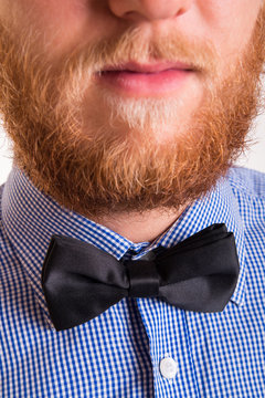 Bearded man with a bow tie