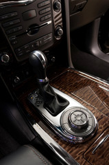 Naklejka premium Gear shift in car. Detail interior of modern auto.