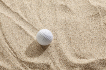 Golf ball in sand trap