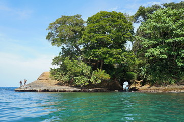 Costa Rica shore with natural cave in the rock