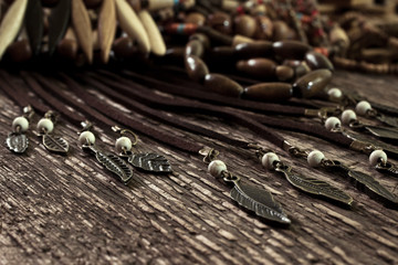 Ethnic jewelry closeup on a wooden surface