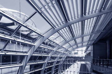 Transparent glass ceiling, modern architectural interior.