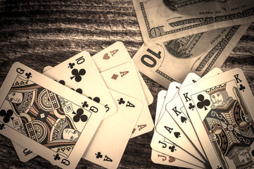 Two pairs and three of a kind vintage poker cards with money