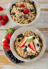 Muesli,  fresh berries and yogurt for  breakfast