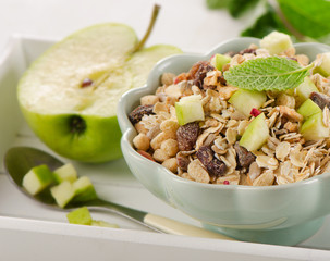 Healthy Breakfast with fresh apple and  muesli.