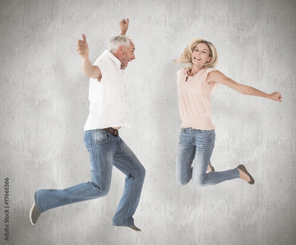 Poster composite image of excited couple cheering and jumping
