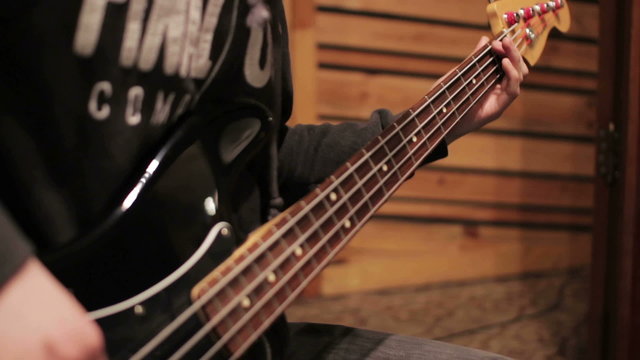 Bass guitar recording on the studio