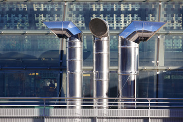 three ventilation chimneys in stainless steel