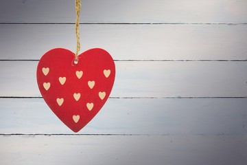 Composite image of cute heart decoration