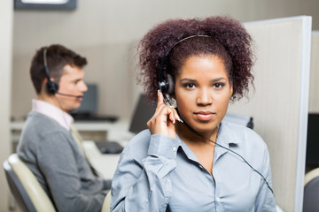 Female Customer Service Representative Using Headset