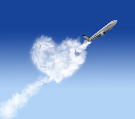 heart shape cloud and plane on blue