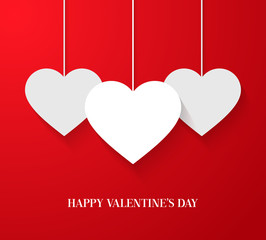 Valentines day card with hanging hearts.