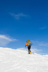 Winter hiking in snowshoes.