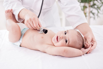 Female doctor pediatrician and patient happy smiling child baby © didesign