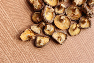 chinese mushroom on wooden bg