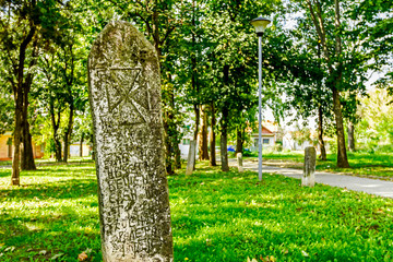 Naklejka premium Maltese cross on headstone
