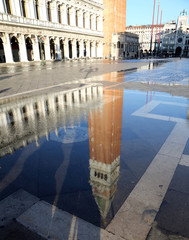 St Mark Bell Tower at high tide during the flooding of square in