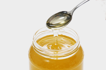cucchiaino del vaso di miele