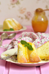 Piece of curd casserole (pudding) with honey dressing.