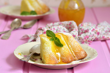 Piece of curd casserole (pudding) with honey dressing.