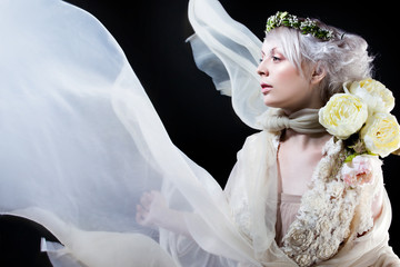 Fashion-art portrait of romantic blonde