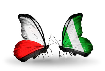 Two butterflies with flags Poland and Nigeria